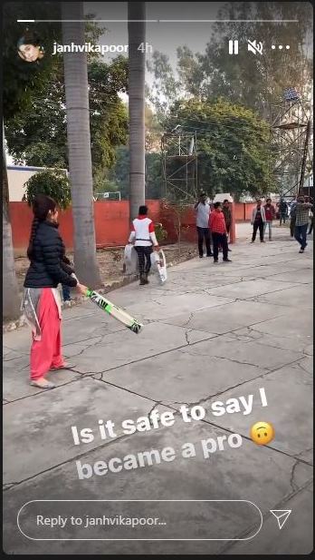 Janhvi Kapoor in cricketing action with the bat