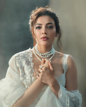 Kajal Aggarwal’s Ode To Her ‘favourite, Gorgeous’ Swans As She Stuns In Ivory Lehenga