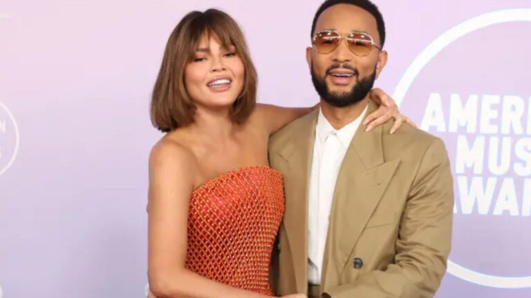 John Legend Helps Chrissy Teigen During Wardrobe Mishap At AMAs 2026