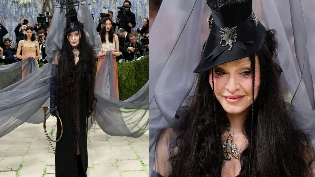 Madonna Wows In Pirate Inspired Headpiece And Flowing Gray Cape At Met